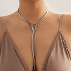 CAMILA - Collar estilo corbatín de malla serpiente con nudo corredizo y borlas en baño de rodio y plata de ley™