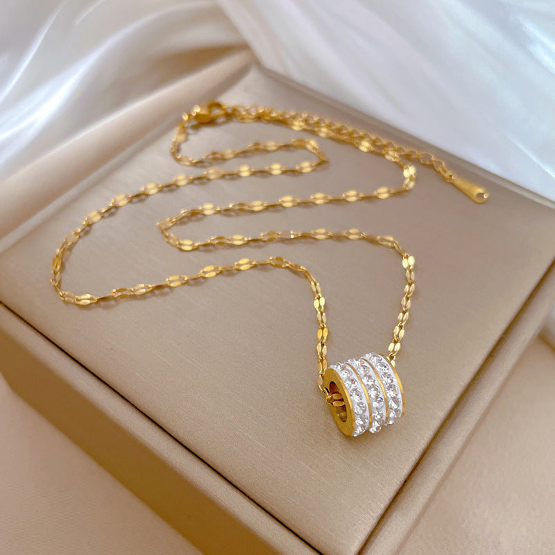 ETERNITY - Collar con colgante cilíndrico de aros en pavé de circonias y baño de oro™