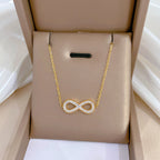 ADELINA - Collar con símbolo de infinito liso en baño de oro™