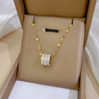 ETERNITY - Collar con colgante cilíndrico de aros en pavé de circonias y baño de oro™