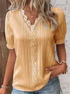 CLARA - Blusa de encaje con cuello en V™