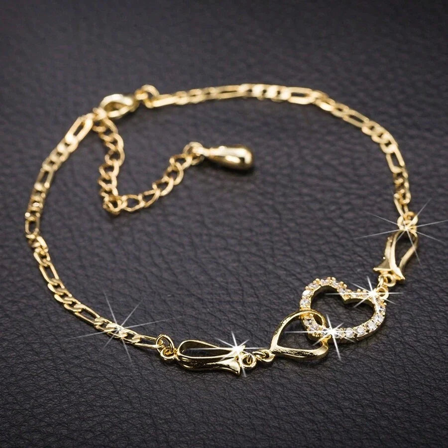 ISABELA - Pulsera de cadena fina con silueta de corazón en pave de circonias™