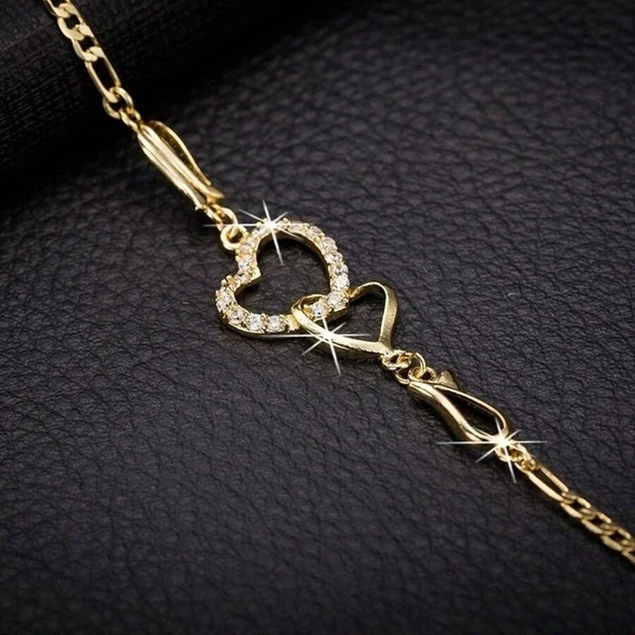 ISABELA - Pulsera de cadena fina con silueta de corazón en pave de circonias™