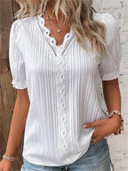 CLARA - Blusa de encaje con cuello en V™