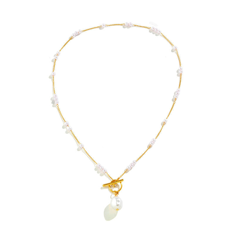 ALBA - Collar de perlas nacaradas con cierre T-Bar y colgante de perla barroca en baño de oro™