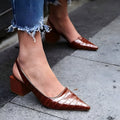 MENCÍA - Zapatos destalonados de tacón ancho con puntera afilada y grabado coco™