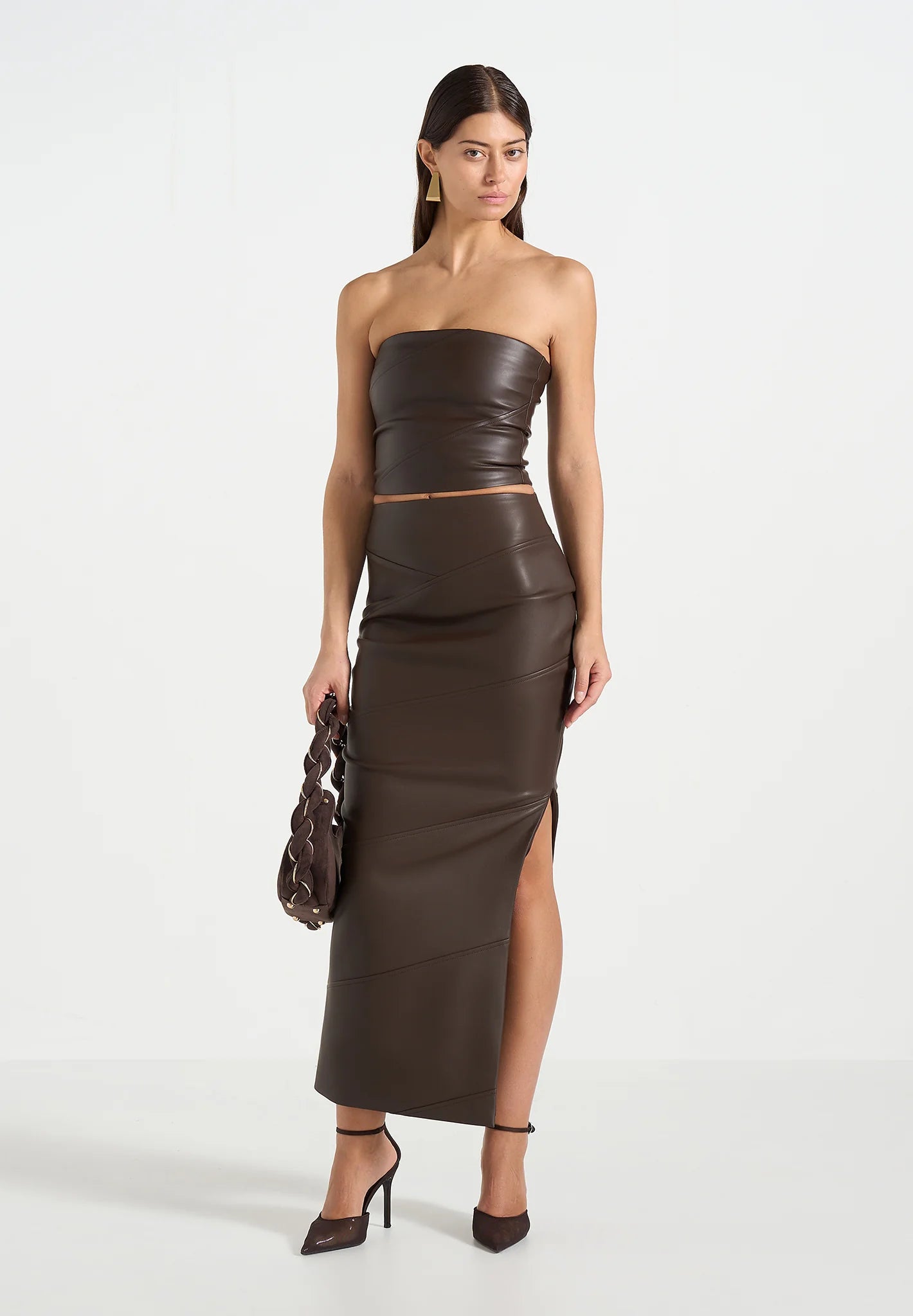 NATALIA-Falda Midi de Cuero y Estilo Contemporáneo
