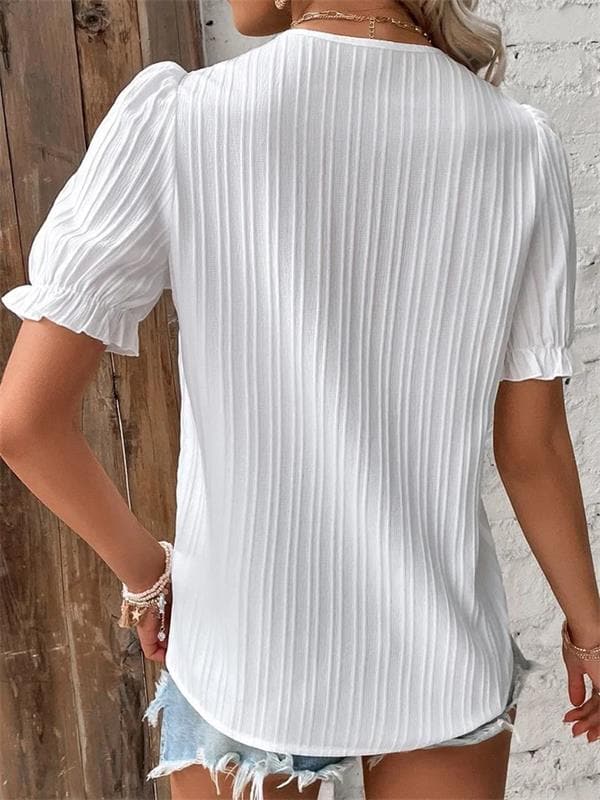 CLARA - Blusa de encaje con cuello en V™