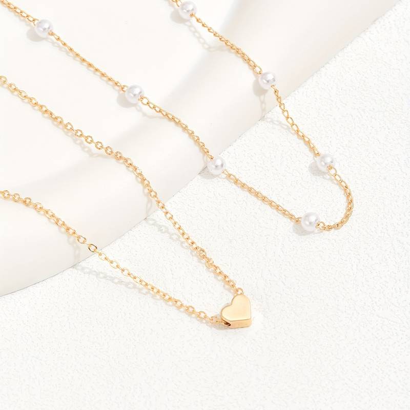 ARIEL - Collar doble de cadenas finas con perlas y dije de corazón en baño de oro™