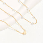 ARIEL - Collar doble de cadenas finas con perlas y dije de corazón en baño de oro™