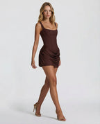 ALMUDENA - Minivestido drapeado de tirantes con lazada posterior™