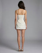 ALMUDENA - Minivestido drapeado de tirantes con lazada posterior™
