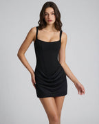ALMUDENA - Minivestido drapeado de tirantes con lazada posterior™