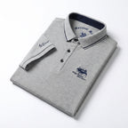 SANTI - Polo de manga corta en piqué con detalles a contraste y bordado emblemático™