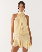 LEIRE - Minivestido plise halter en tono mantequilla™