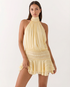 LEIRE - Minivestido plise halter en tono mantequilla™