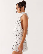 LUCÍA - Minivestido halter de lunares con espalda al aire™