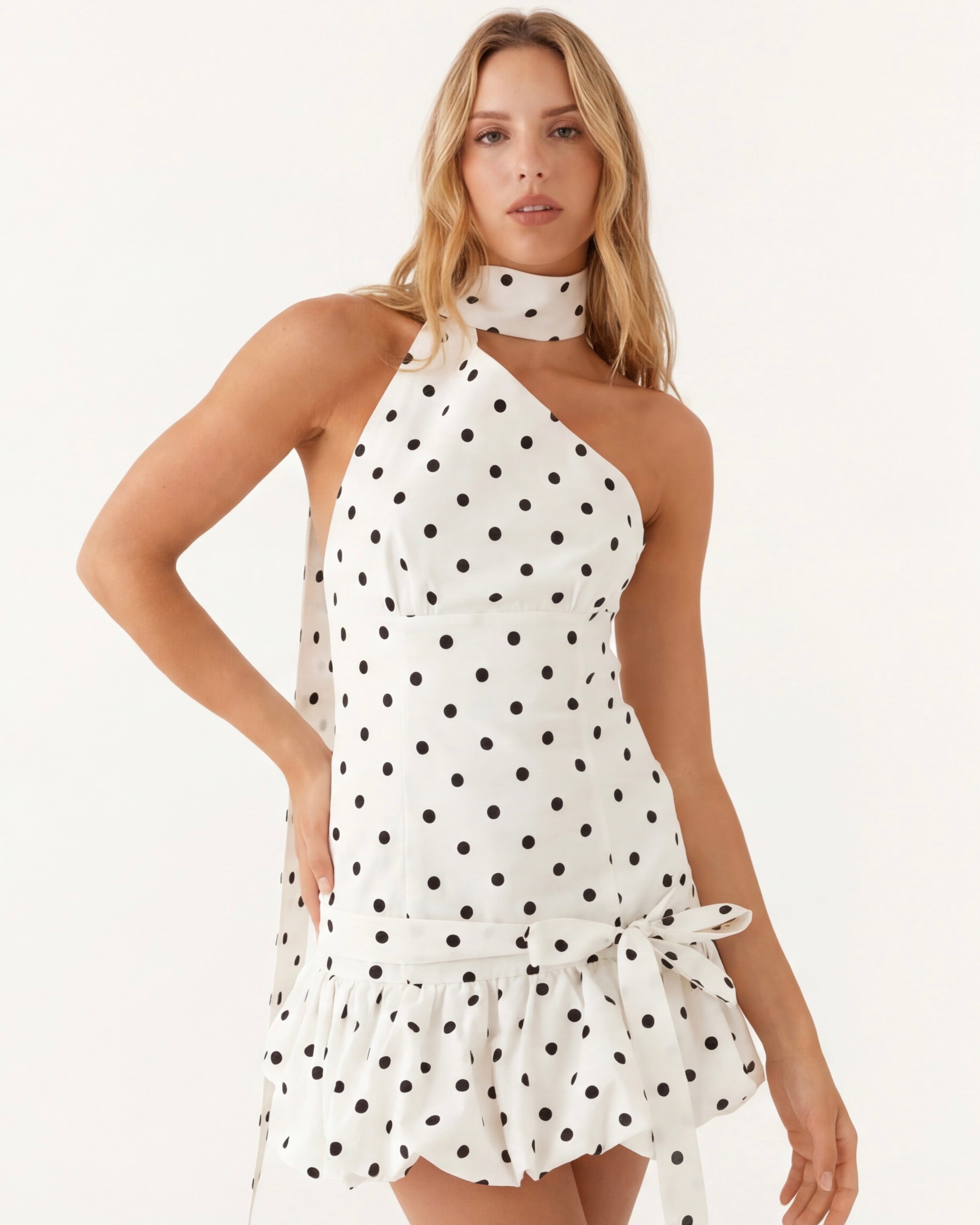 CARLOTA - Minivestido halter de lunares con lazada™