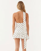 CARLOTA - Minivestido halter de lunares con lazada™