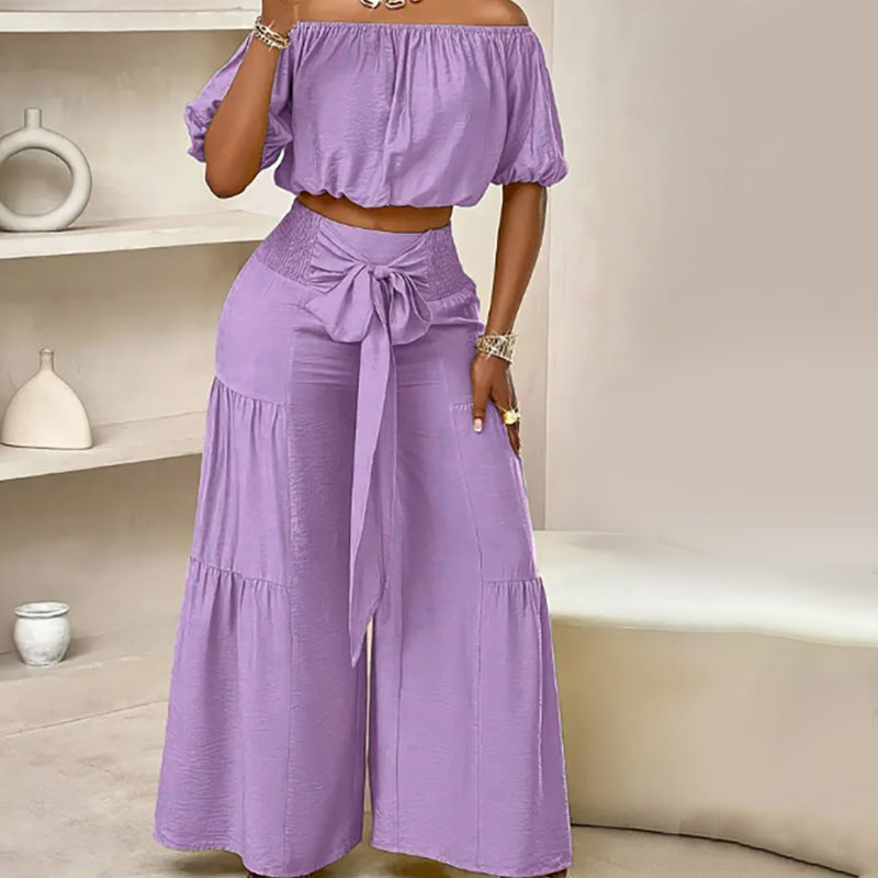 👚 49 % DE RÉDUCTION EN CE MOMENT ! 🌸 Ensemble 2 pièces composé d'un haut à manches bouffantes et épaules dénudées et d'un pantalon à jambes larges – Élégant, confortable et idéal pour les journées d'été ☀️