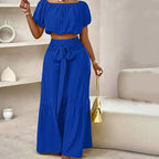 👚 49 % DE RÉDUCTION EN CE MOMENT ! 🌸 Ensemble 2 pièces composé d'un haut à manches bouffantes et épaules dénudées et d'un pantalon à jambes larges – Élégant, confortable et idéal pour les journées d'été ☀️