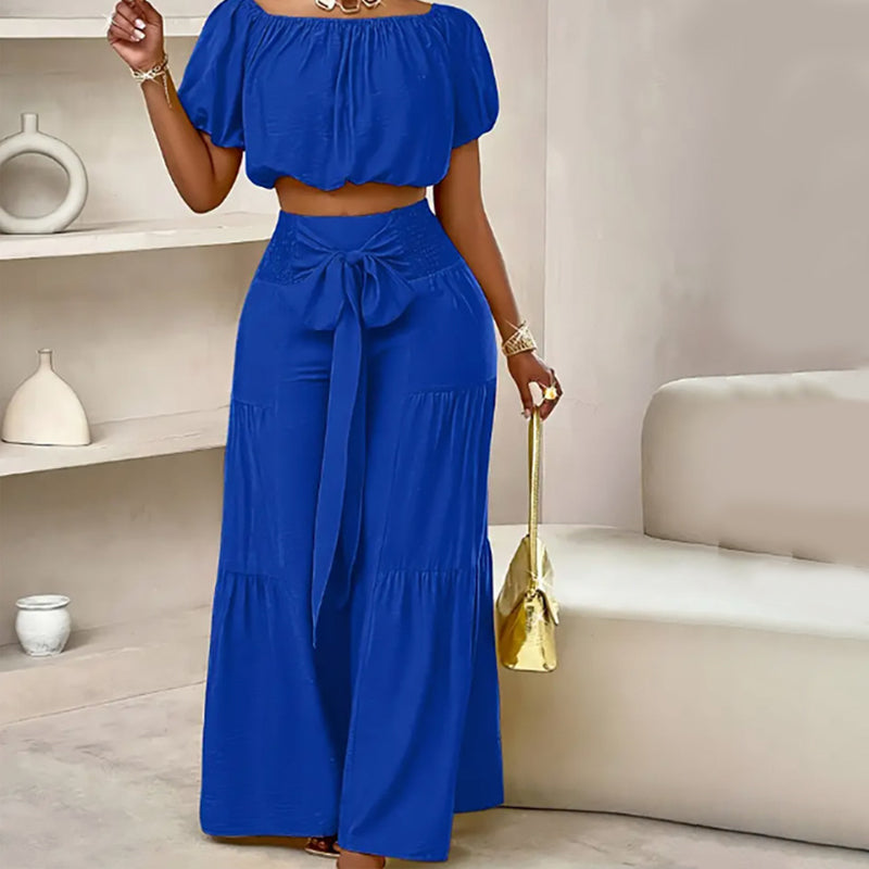 👚 49 % DE RÉDUCTION EN CE MOMENT ! 🌸 Ensemble 2 pièces composé d'un haut à manches bouffantes et épaules dénudées et d'un pantalon à jambes larges – Élégant, confortable et idéal pour les journées d'été ☀️