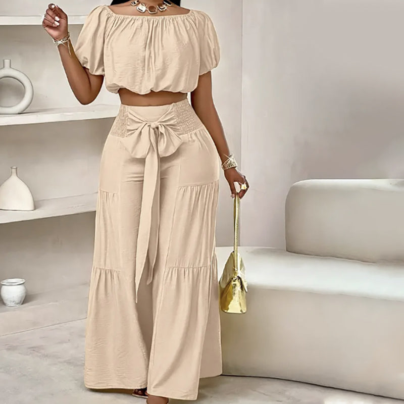 👚 49 % DE RÉDUCTION EN CE MOMENT ! 🌸 Ensemble 2 pièces composé d'un haut à manches bouffantes et épaules dénudées et d'un pantalon à jambes larges – Élégant, confortable et idéal pour les journées d'été ☀️