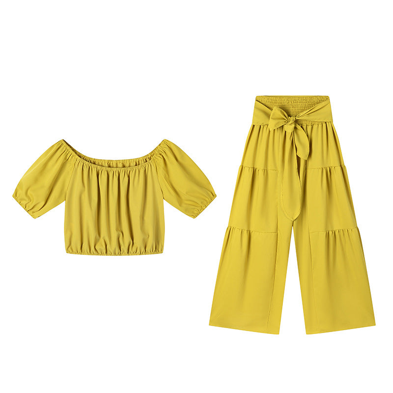 👚 49 % DE RÉDUCTION EN CE MOMENT ! 🌸 Ensemble 2 pièces composé d'un haut à manches bouffantes et épaules dénudées et d'un pantalon à jambes larges – Élégant, confortable et idéal pour les journées d'été ☀️