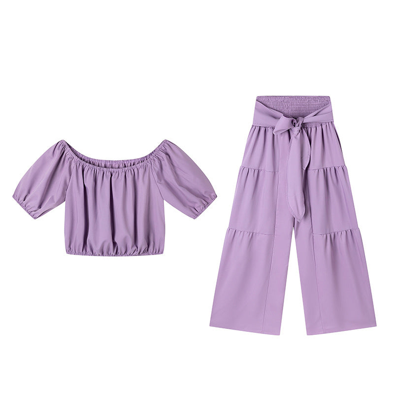 👚 49 % DE RÉDUCTION EN CE MOMENT ! 🌸 Ensemble 2 pièces composé d'un haut à manches bouffantes et épaules dénudées et d'un pantalon à jambes larges – Élégant, confortable et idéal pour les journées d'été ☀️