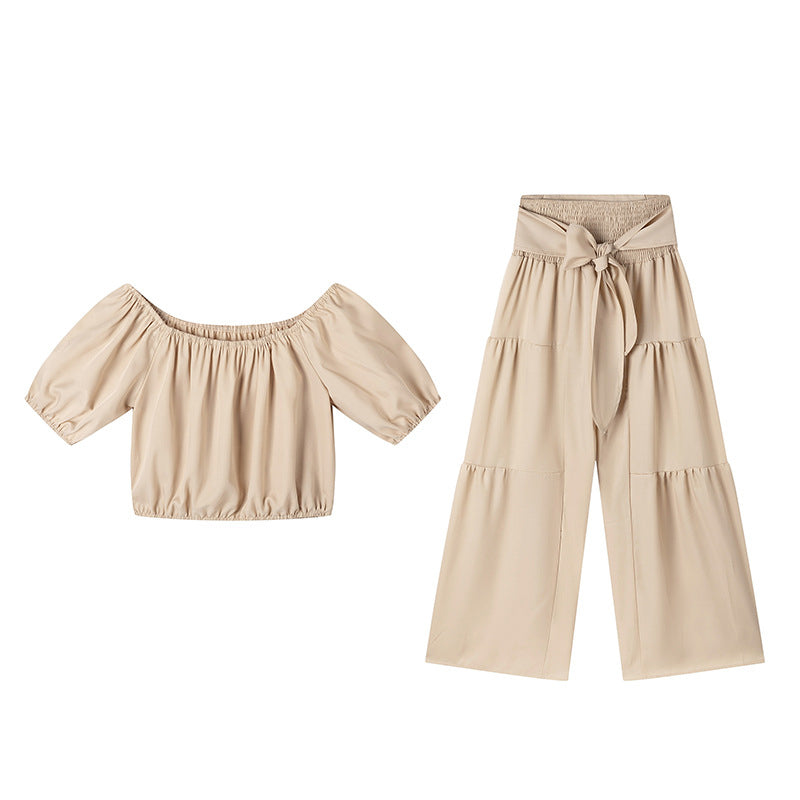 👚 49 % DE RÉDUCTION EN CE MOMENT ! 🌸 Ensemble 2 pièces composé d'un haut à manches bouffantes et épaules dénudées et d'un pantalon à jambes larges – Élégant, confortable et idéal pour les journées d'été ☀️