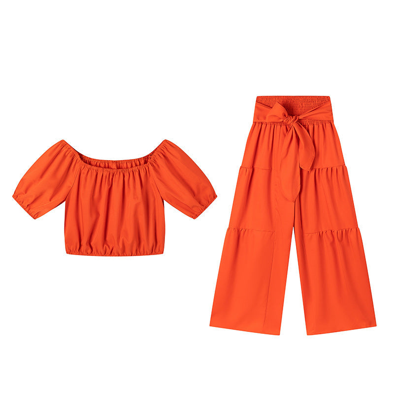 👚 49 % DE RÉDUCTION EN CE MOMENT ! 🌸 Ensemble 2 pièces composé d'un haut à manches bouffantes et épaules dénudées et d'un pantalon à jambes larges – Élégant, confortable et idéal pour les journées d'été ☀️