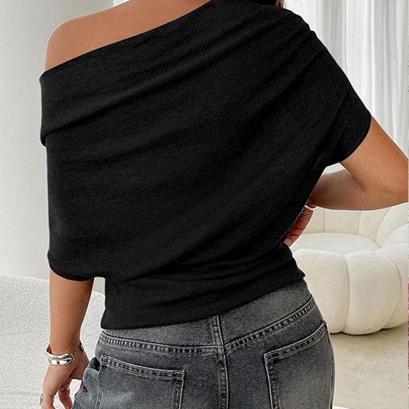 PAOLA - Top asimétrico de manga murciélago y hombro caído™